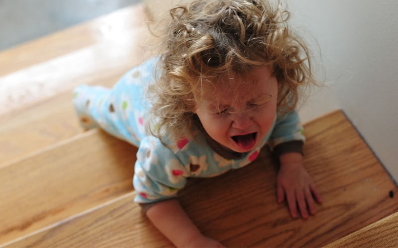 A toddler is throwing a fit