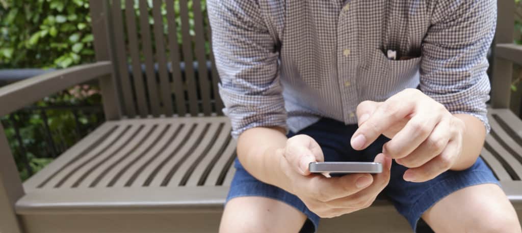 man using mobile smart phone apps