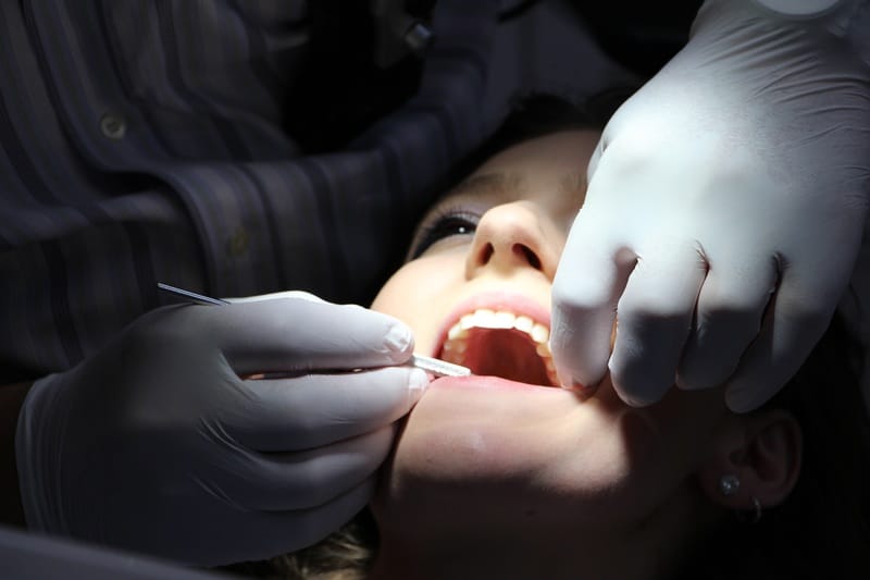 A patient is getting a teeth cleaning
