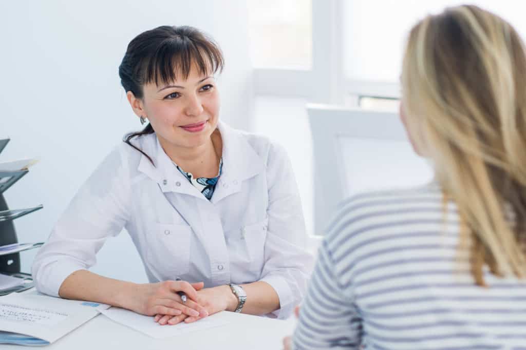 Female Doctor and Patient