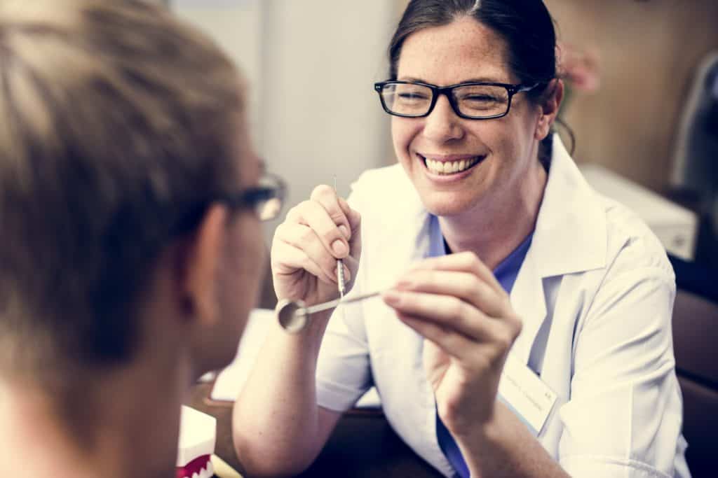 Dentist with a Patient