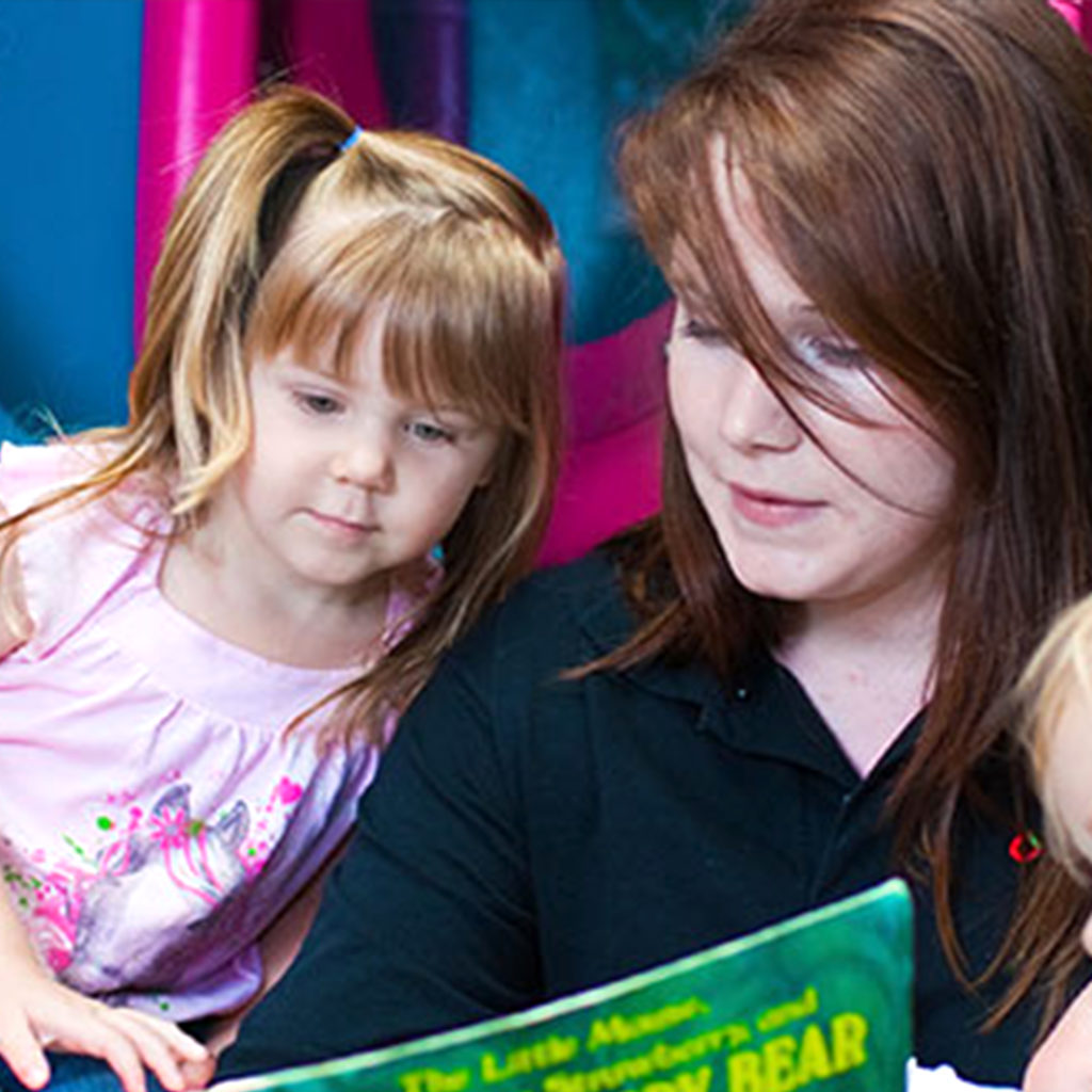 Female College Childhood Education Instructor and Child