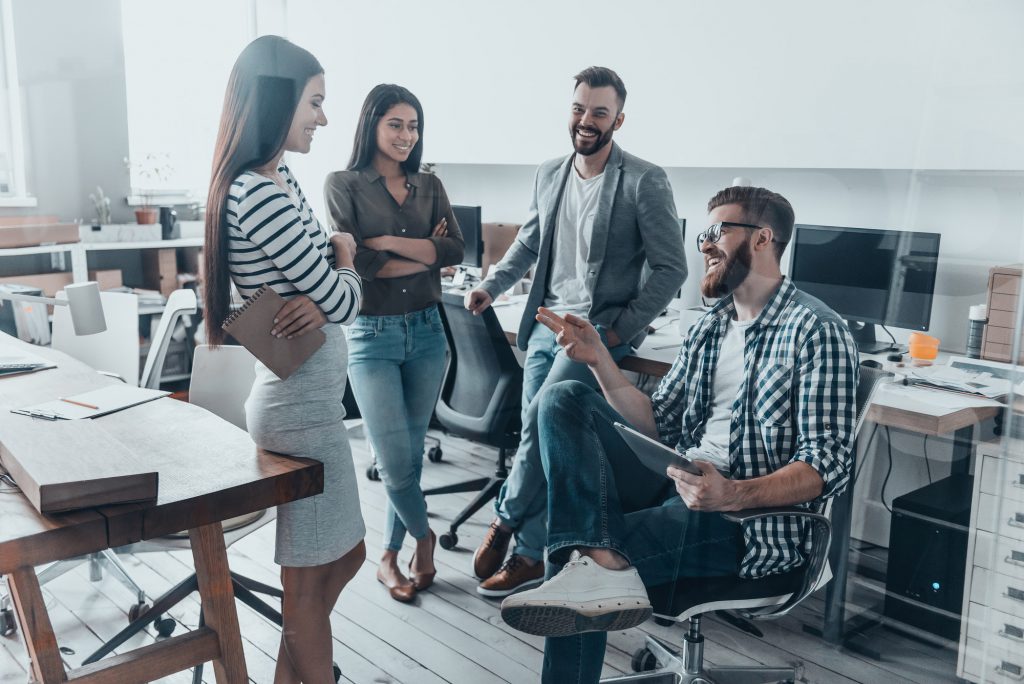 a group of people having a meeting